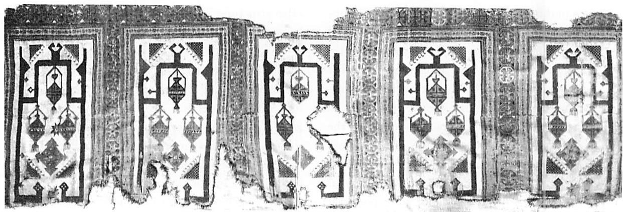 15th century Turkish carpet with multiple niches