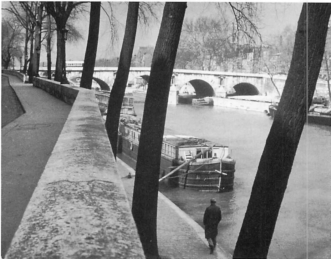 The edge of the river Seine: a deep and structured boundary. Layers and layers of walks, walls, stone, quays, and trees, all work to protect and enclose the river and make it more useful, more a living part of Paris.