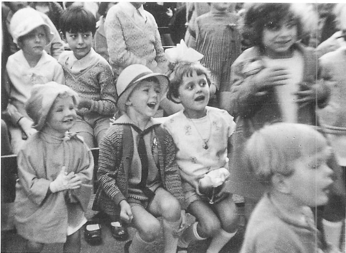 Children gape as they watch the Punch and Judy show