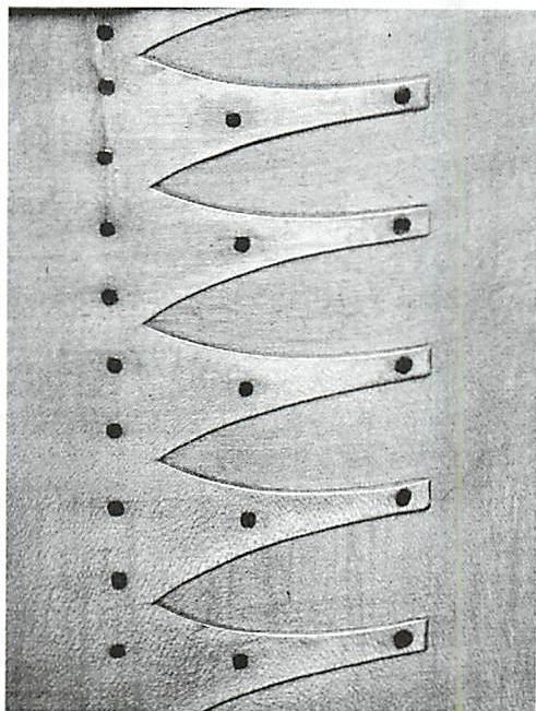 The beautifully shaped finger joints and the positions of brads