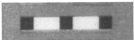 The pattern R: a pattern made of seven squares, three black squares, and four white squares