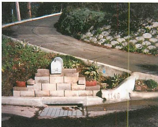 Mailbox which is not structure-preserving. The center which is created under the mailbox does not arise naturally from the surrounding wholeness.