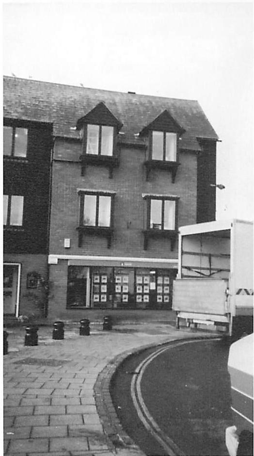 Ugliness and loss of structure-preserving transformations in two pseudo-traditional buildings. Arundel, England. The buildings on these pages are structure-destroying to themselves, in their internal geometry, just as surely as the freeway built through downtown Providence (page 109) destroyed the structure and fabric of that community. These buildings do not preserve the structure of their surroundings; nor of their own substance.