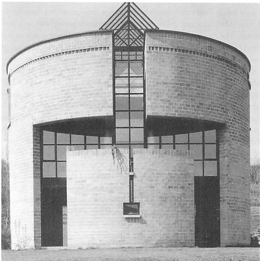 Cylindrical house by Botta. This cannot be produced by an unfolding process. It is controlled by an image, which would dissolve if taken step by step through a sequence of structure-preserving transformations.