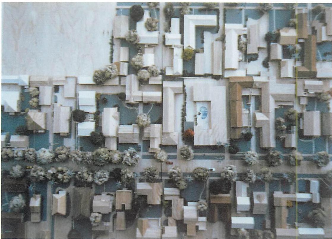 A model of a block in Pasadena, in which a dozen different apartment buildings are visible, generated by the sequence described in this chapter. The simulation was carried out by my students at the University of California.