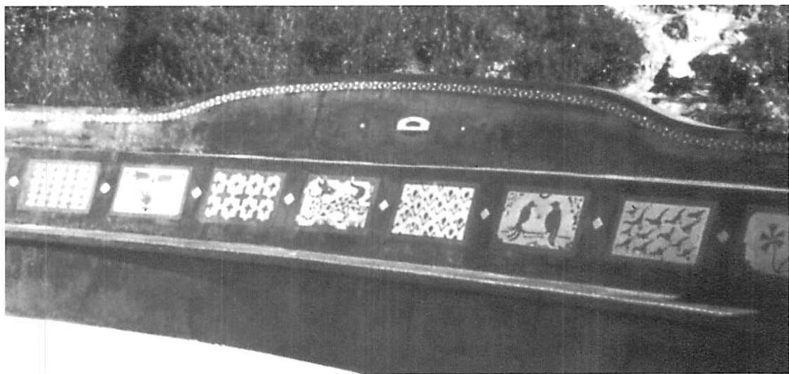 The bench from the front, showing details of the hand-made terrazzo panels designed and shaped and cast in place to fit the landscape and the place while we built the bench