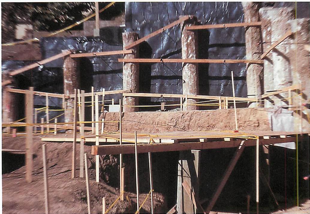The piers exposed after drilling and pouring, and ready for forming the foundation and retaining wall between the piers
