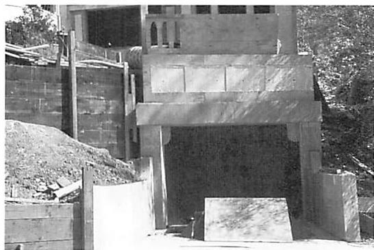 Formwork on the massive concrete brackets which frame the garage