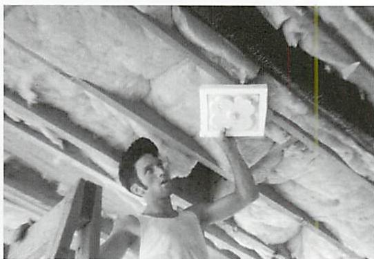 Trying the size and weight of one of the versions of the rosettes to go in the middle of the ceiling panels