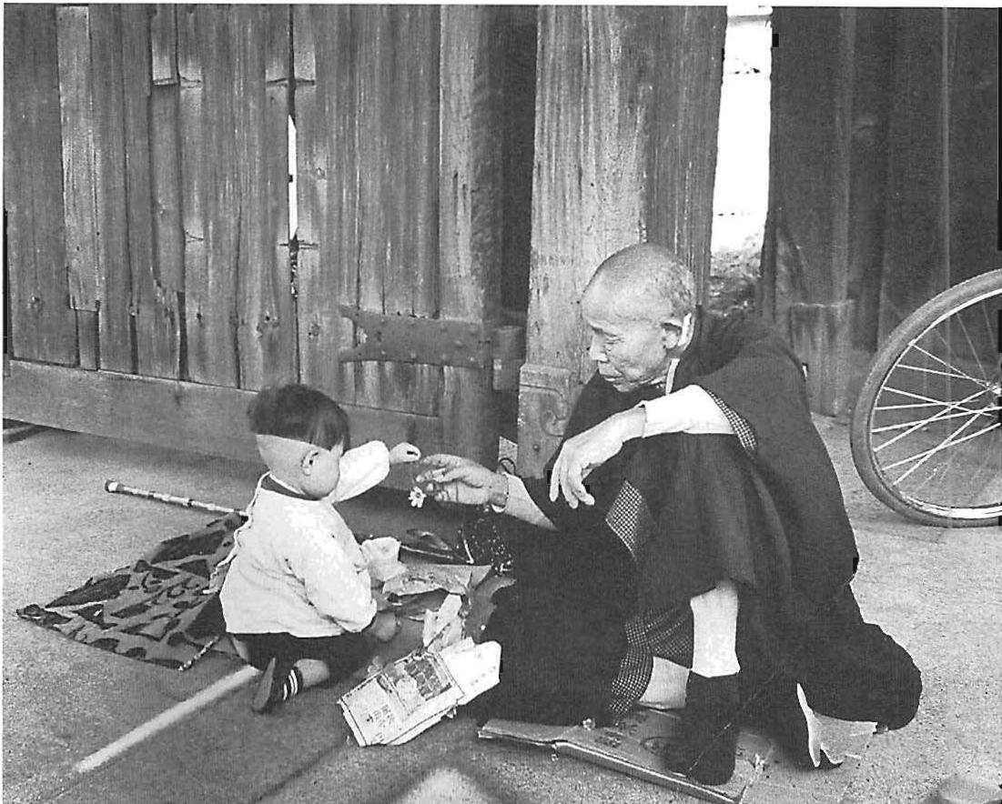 A comfortable and ordinary belonging on a street in Shanghai. There is nothing much to it: but how far from the mechanical quality of people walking like robots under the French apartment building!