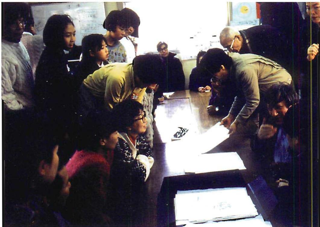 Family members in Hazama neighborhood meeting with us to discuss the new neighborhood plan