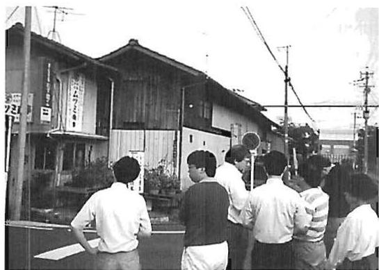 Walking about the present neighborhood to see what aspects were important, what to keep, and what to take away (Left) Listening to another resident expressing his views (Right)