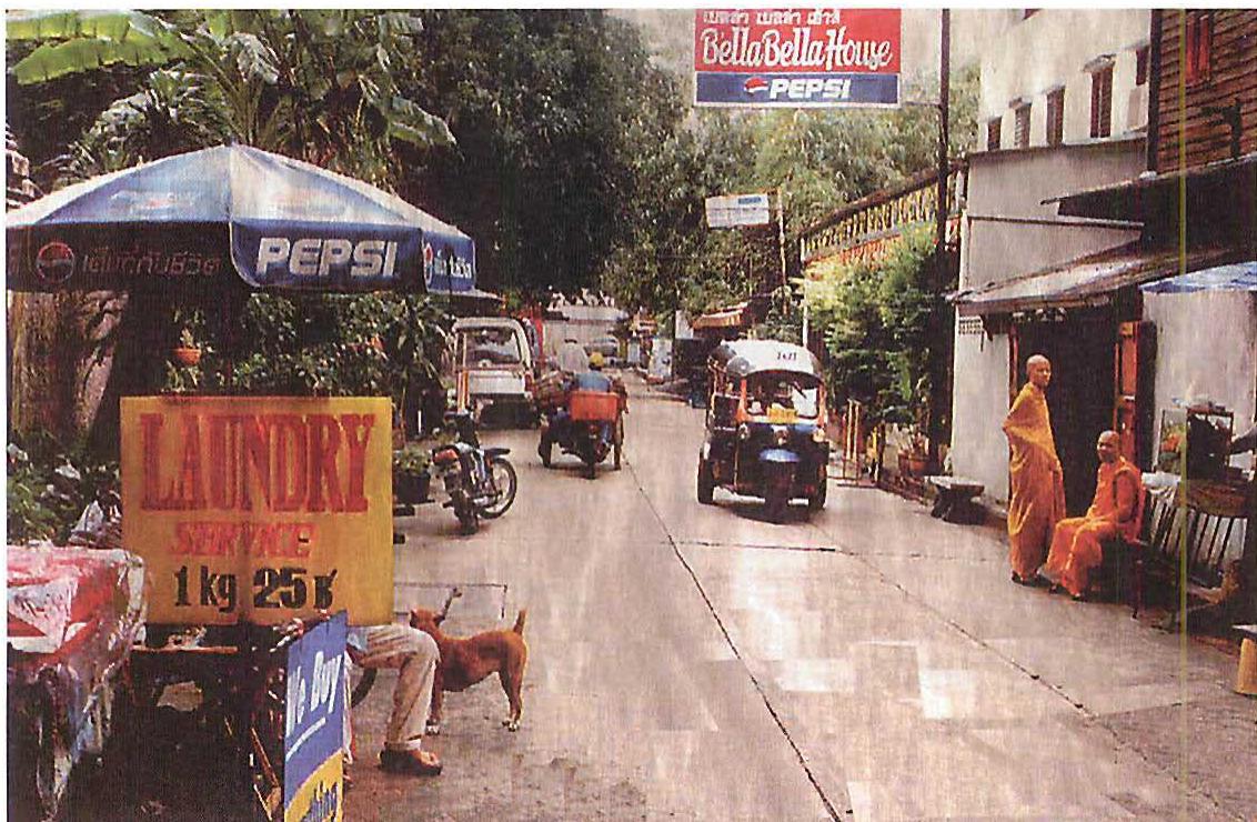 A Bangkok neighborhood in warm rain, has its own unique identity.