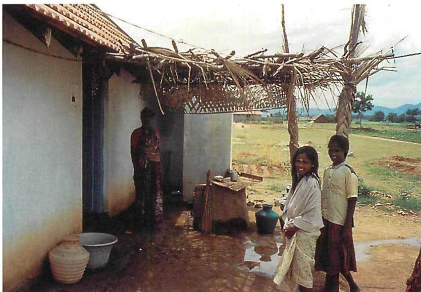 One of the houses in Howard Davis's community in Kerala. In this case the people live under conditions of extreme poverty, but even so are able to maintain a simple dignity with the house, a veranda, and a view into open land, the very same conditions that makes the plan of the Venezuelan project work.
