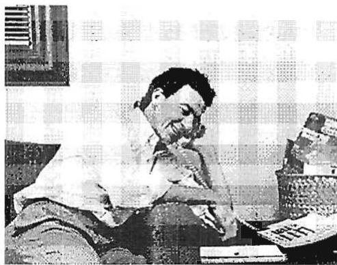 James Maguire on the phone in his present office