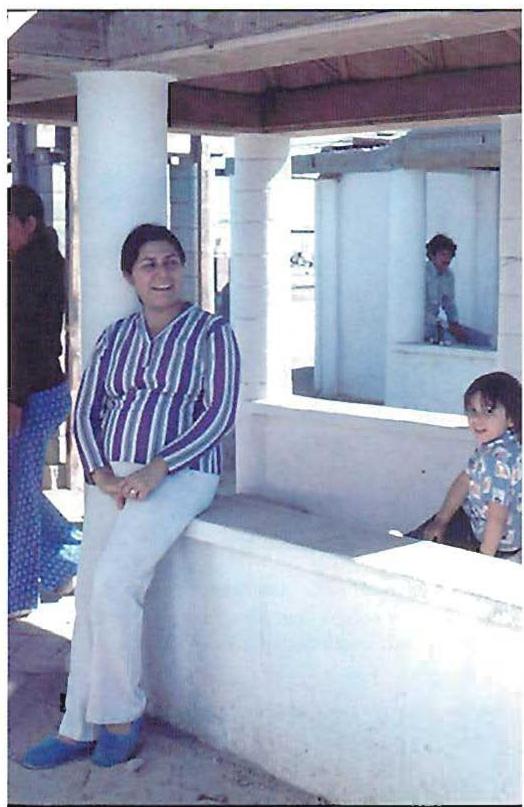 Two families participating in another similar one of our projects, not in Colombia but in Mexico—Lilia Duran happy to have her house. Julio and Teresa Rodriguez resting after a hard day's work.