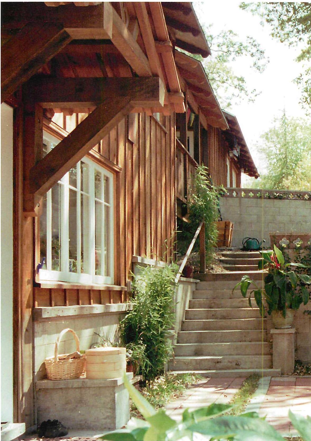 Outdoor room and terrace of the George house. Christopher Alexander and Randy Schmidt, 1997. The character of this room has been profoundly affected by its position. Arising from the site, a saddle on the hill, and the great trees around.