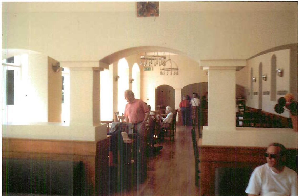 Arched entrance to the main dining room. West Dean Visitors Centre. Many visitors speak of the comfort and quiet joy that comes with being in this building. Christopher Alexander and John Hewitt, 1996.