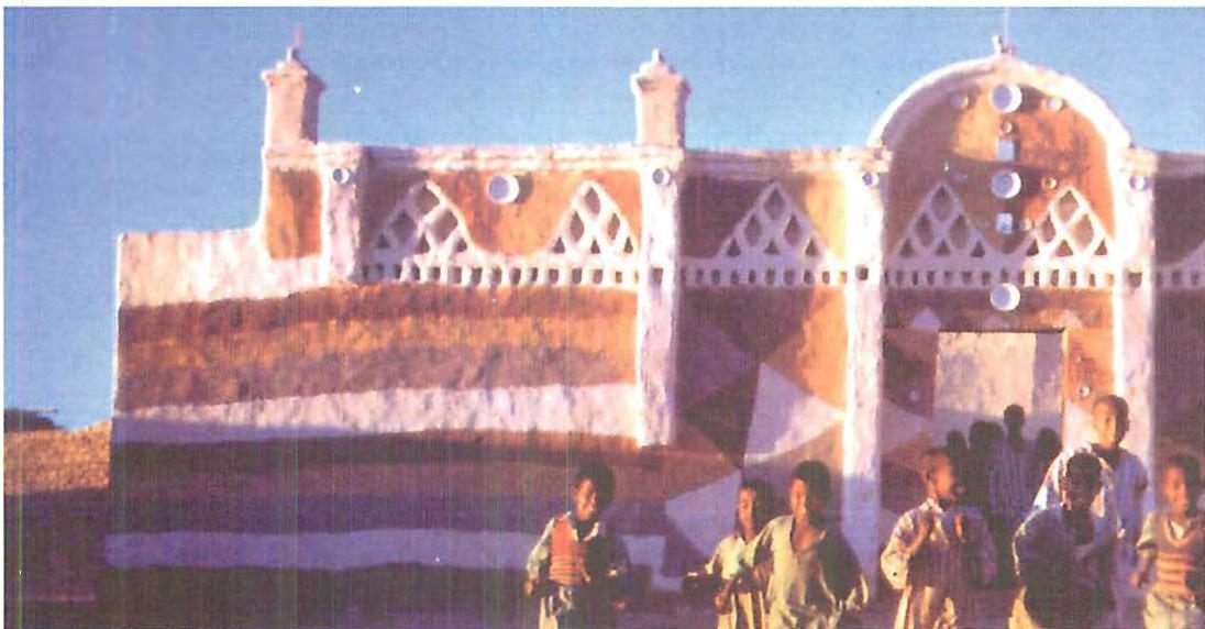 Mud plaster details in a traditional Nubian building; the mud and plaster are used to build up beautiful centers in every part.