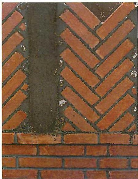 Making a mockup for an entrance porch with brick plinth, stone verticals, red herringbone inserts.