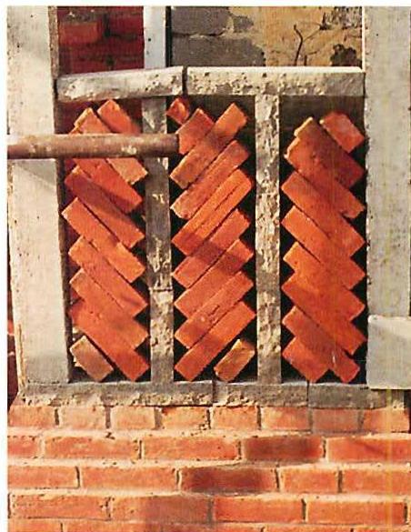 On the left, a computer-enhanced simulation to test the use of black mortar, concrete, and rate-red brick. Not very good. Of course we didn't build this one.