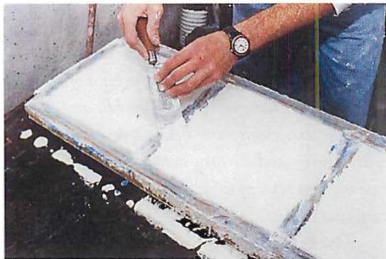 Cleaning off the excess white terrazzo