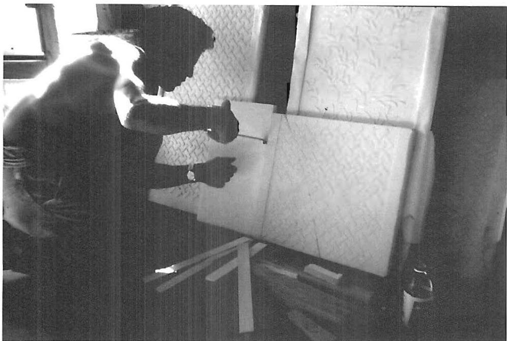 Randy checking widths, details of the edge band on the plaster panels of another project. On these panels, it turned out that a difference between 1/8, 1/4, and 3/8 of an inch in thickness was of tremendous significance.