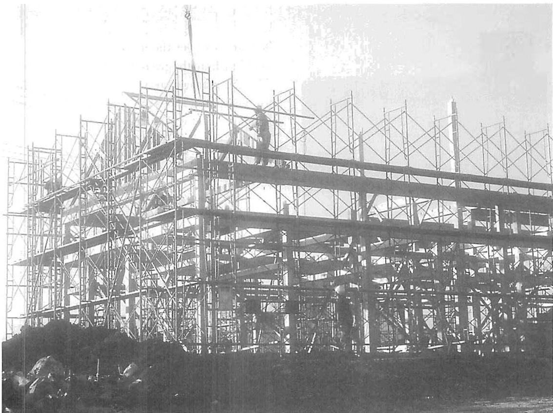 Heavy carpentry work on a fairly large building, one of ours, under construction in Japan.