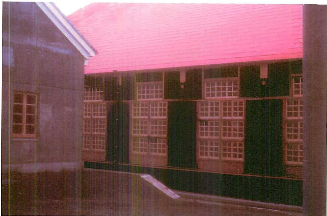 The eave, the end of the truss, plus the windows of the Gymnasium on the Eishin Campus shows an example of such a