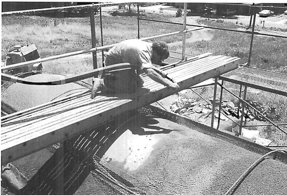 Shooting gunite over forms to make the ceiling vault and roof of the workshop. I spent hours on that bridge shooting a fine stream of material to shape the outer vault surfaces.