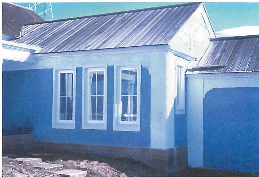 Martinez house from the side, after the shoot, and after roof surface and windows have been installed