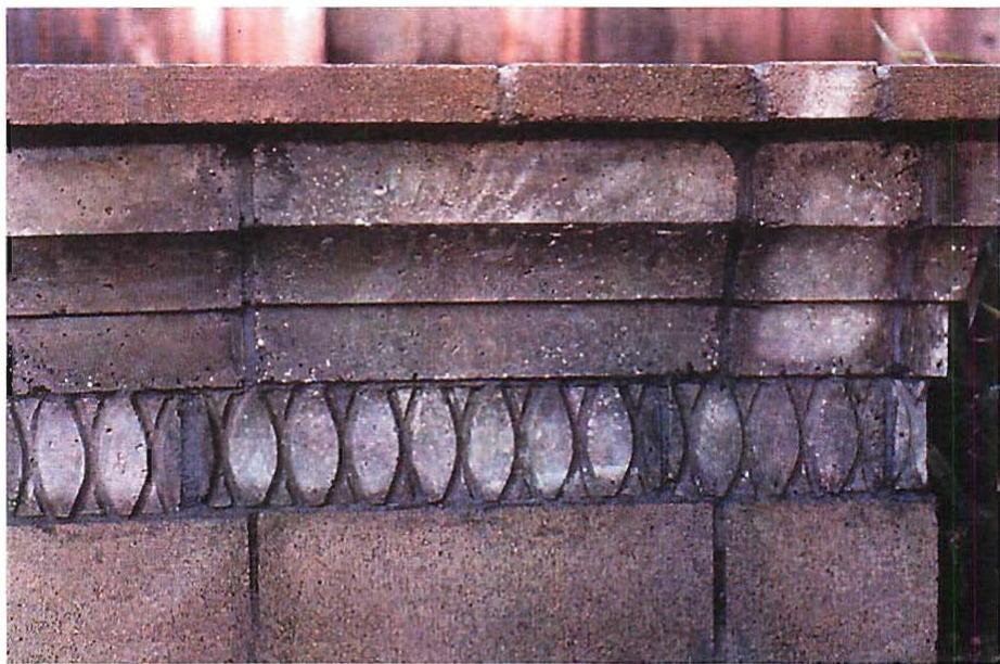 Special cast blocks to be used with normal concrete blocks. Eileen Tumin, 1996