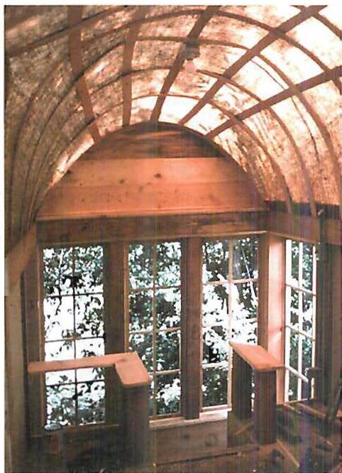 Interior of the Etna Street cottage, Berkeley, 1973. Left: Barlap impregnated with fiberglass resin forming a translucent roof. Right: Alcove under the stair, made with a lightweight concrete vault.