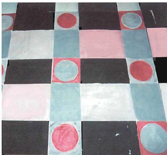 Black and red mockup of another floor design, worked out by eye on the floor of another warehouse