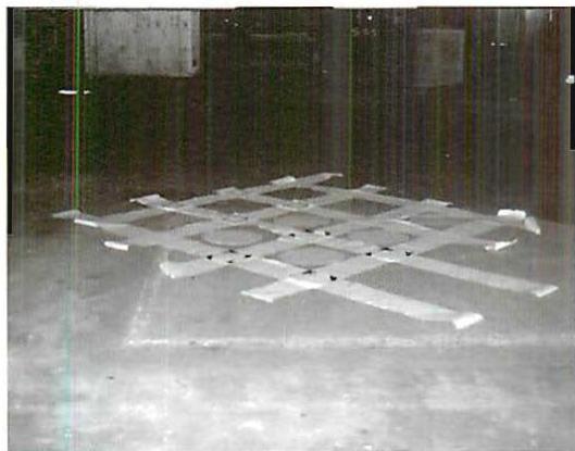 An earlier stage, when strips are first being laid out to get the gist of a successful configuration on the floor