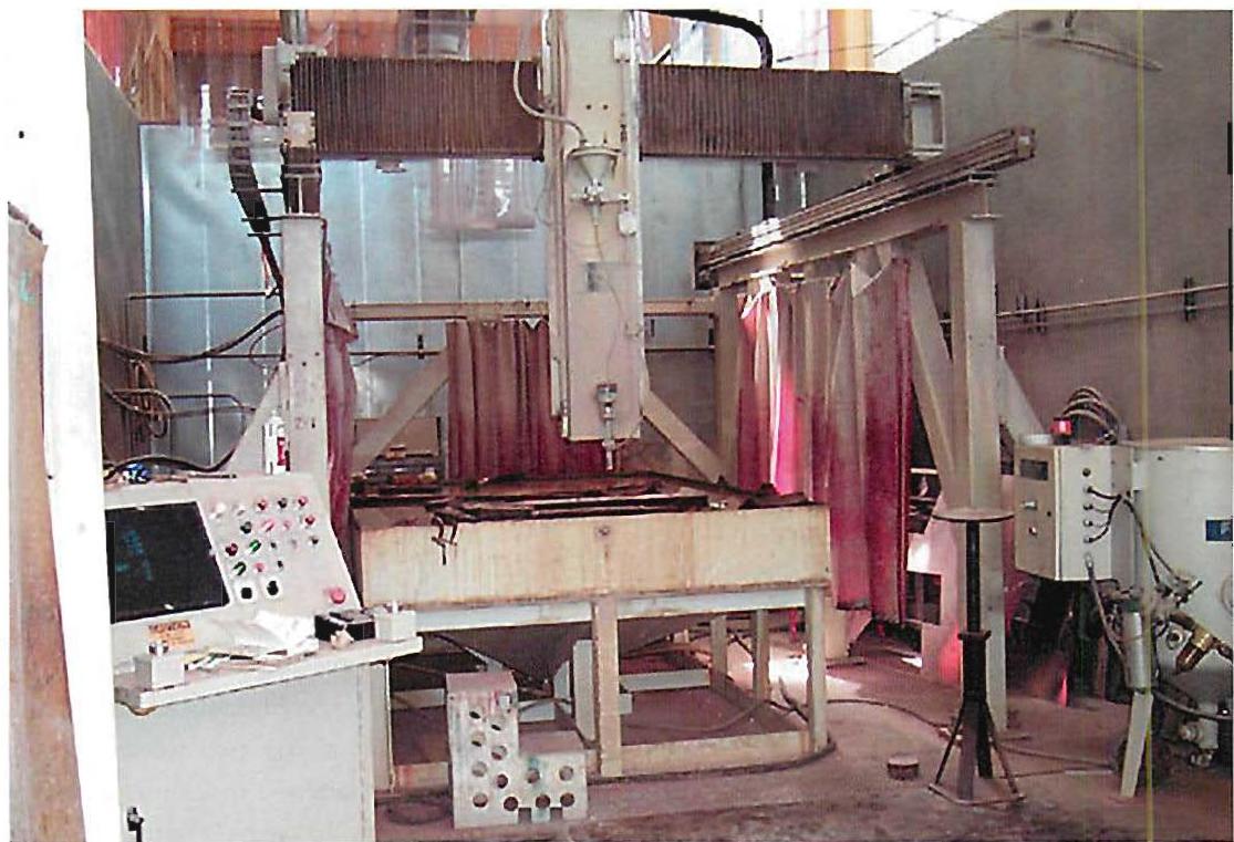 A computer-controlled water-jet cutter in Germany