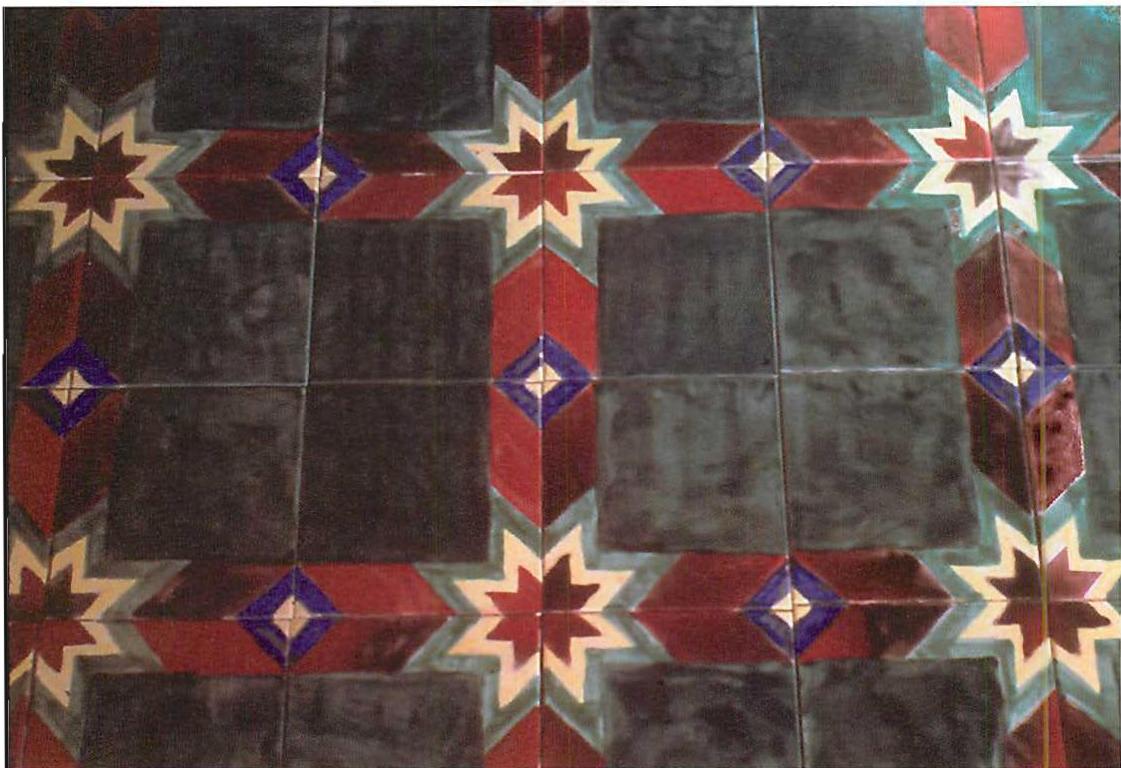 Green, red, yellow and blue star pattern made in our workshops. Christopher Alexander and Seth Wachtel, 1988.