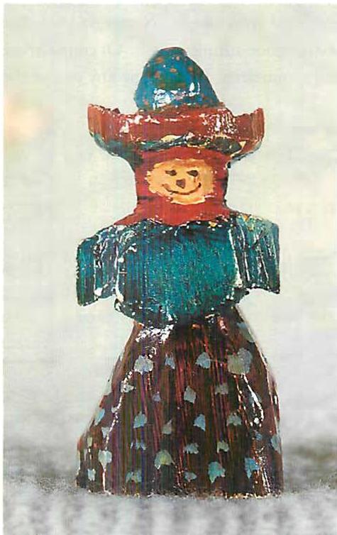 Hand-painted doll I made for my children, pine and gouache.