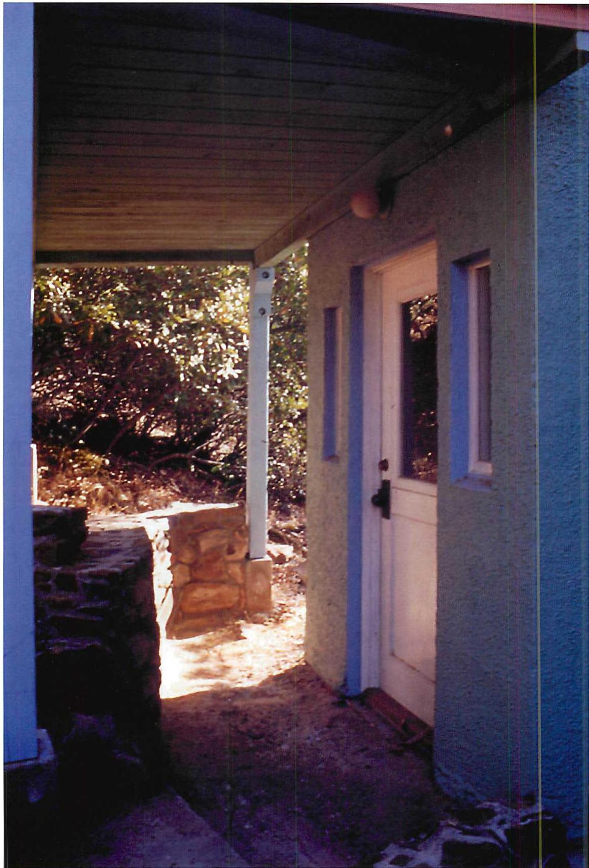 Luminosity of color, appearing by judgment. Hand-painted entrance, Berryessa house, Christopher Alexander