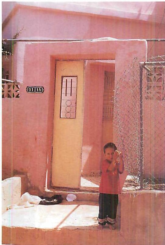 A family's doorway from East Wahut, Jordan.