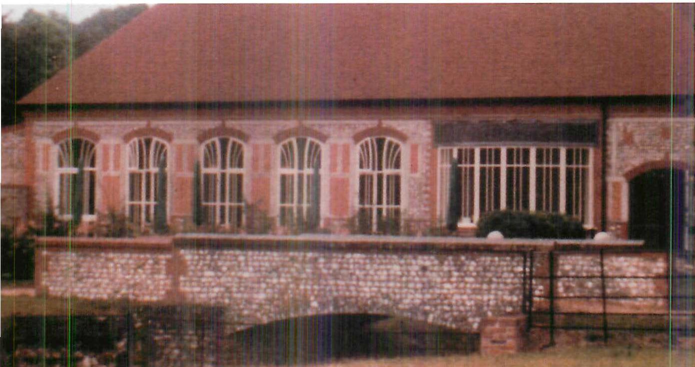 South wall of the West Dean Visitor's Centre, the River Levant, and a small bridge now modified and made part of the building, 1996.