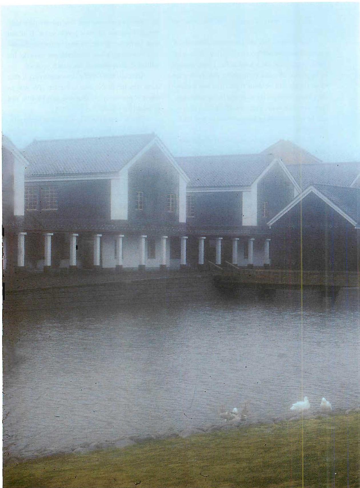 A misty day, fog and drizzle. The lake and Gymnasium of the Eishin Campus.