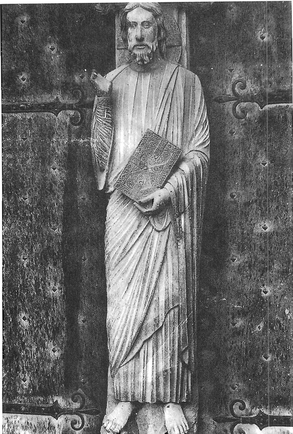 The folds of cloth are pictures of the “I.” Even the hinges and the bolt-heads on the door are yet again shaped to be pictures of the “I.”