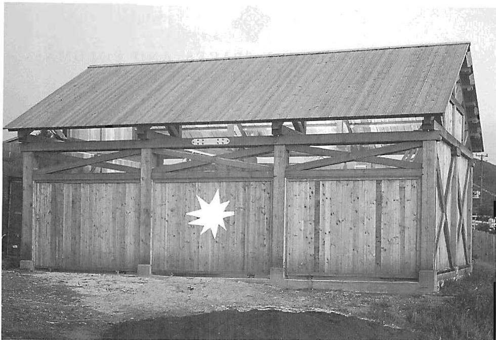 The star in its position on the barn. How strong this irregular star, with its spontaneity, compared with the perfectly drawn star below.