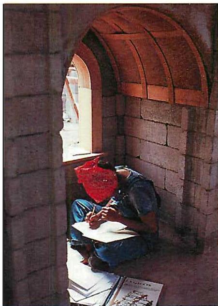 Student sitting in a tiny niche