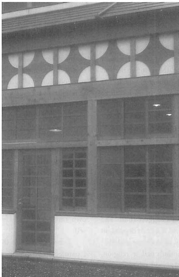 The building, as it is affected by the motive: to make a gift for God. A detail of the cafeteria on the Eishin Campus, Tokyo.